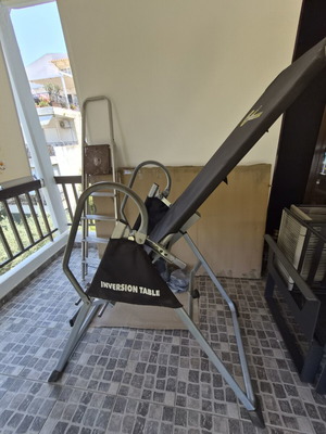 Inversion table used, supports up to 136 kg