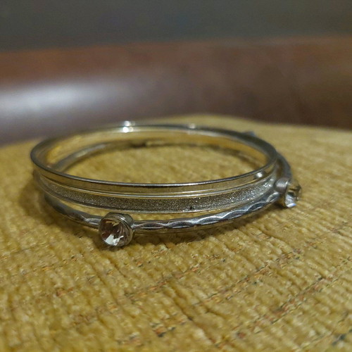 Silver bracelets set of 3 like new with stones and glitter