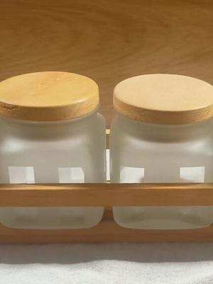 Glass jars set of 4 with wooden lids and base like new