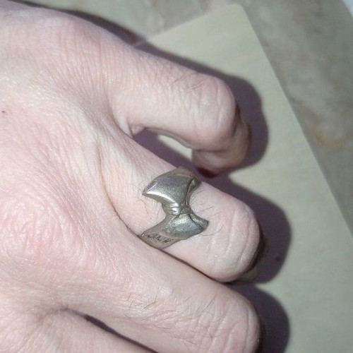 Silver bow ring used