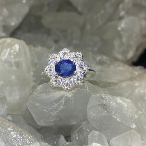 Handmade silver ring with natural blue sapphire and moissanites