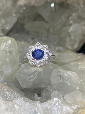 Handmade silver ring with natural blue sapphire and moissanites