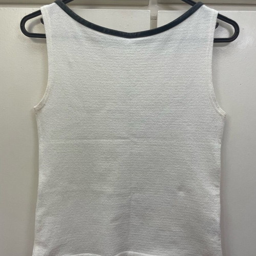White top size S/M like new with leather detail on neckline