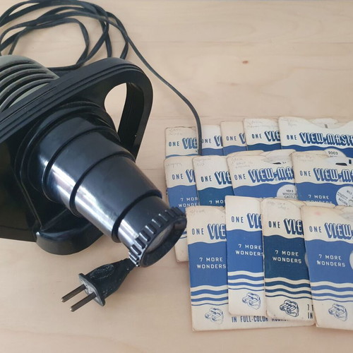 View-Master projector with 13 used reels from 1948-1952