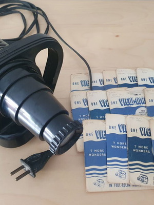 View-Master projector with 13 used reels from 1948-1952