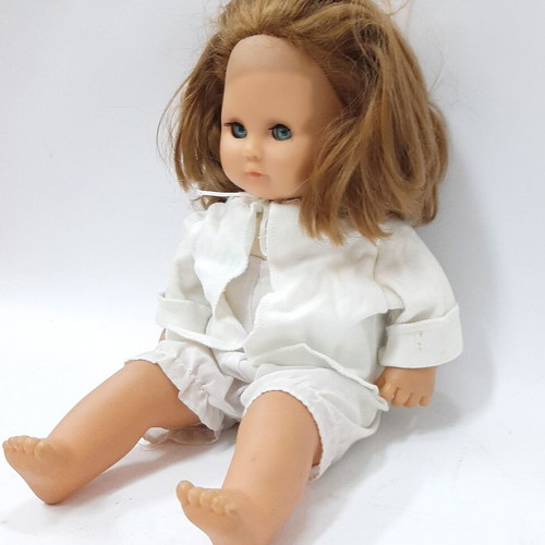 Vintage hard plastic doll with blue sleeping eyes, 1970s