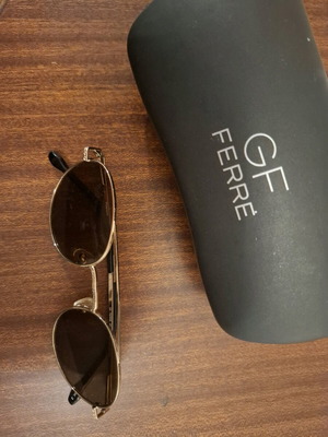 Gianfranco Ferre sunglasses like new, gold color
