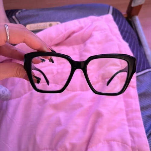 Prada eyeglasses black used with replaceable lenses