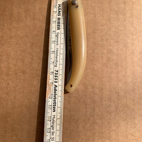 Handmade small folding knife used with engraved name