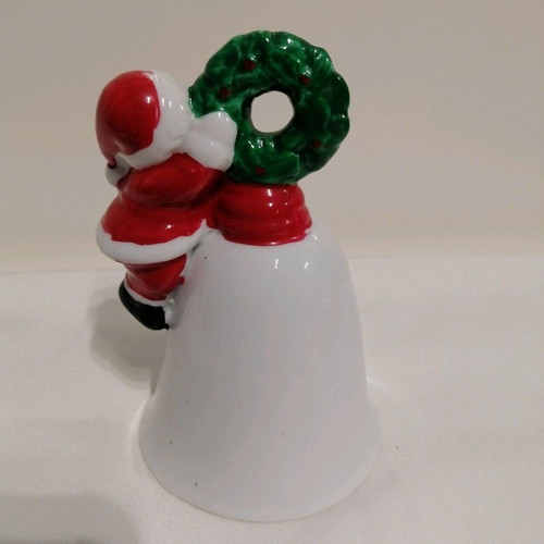Ceramic bell like new with Santa Claus and wreath