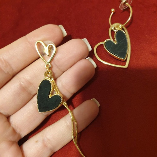 Earrings new gold with black, different design for each ear