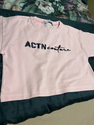 Action Sportswear short-sleeve pink cotton shirt like new 140 cm for 10 years