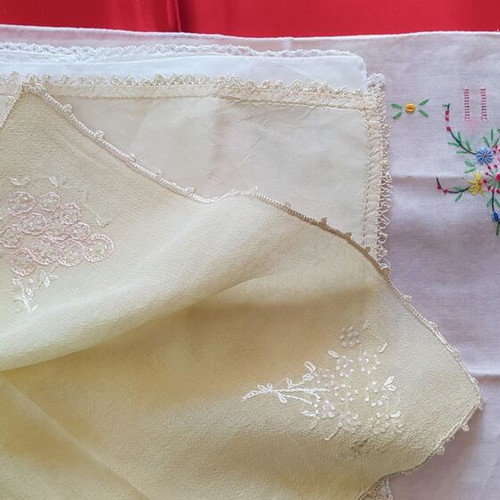 Vintage collection of 40 used embroidered linens