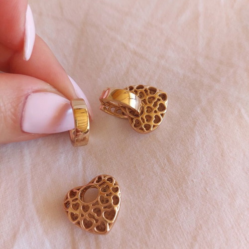 Apefthon stainless steel earrings like new, gold hearts