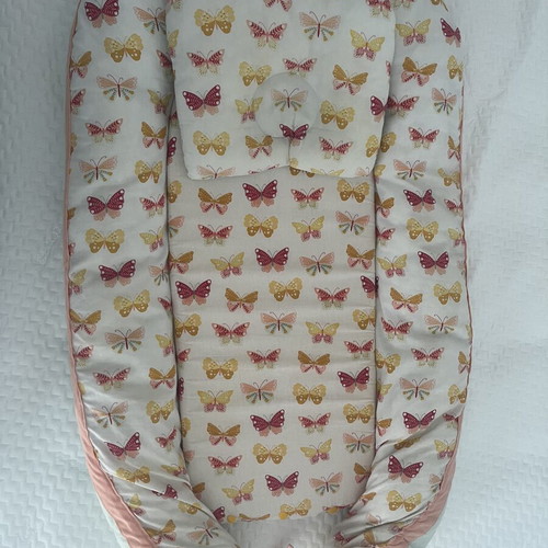 Baby nest with pillow used