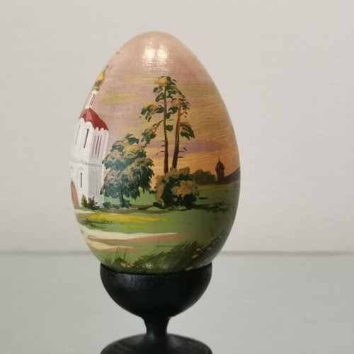 Russian egg used with hand-painted design and wooden base