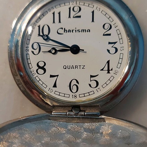 Charisma pocket watch like new with battery silver