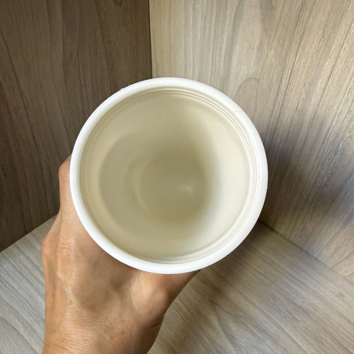 Reusable plastic coffee cup with screw lid