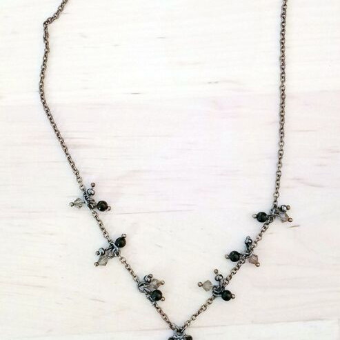 Women's chain necklace with black stones and zircon