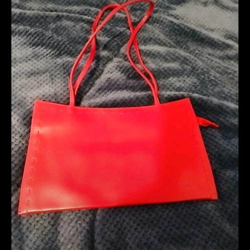 Red shoulder bag minimal design with thin straps, new