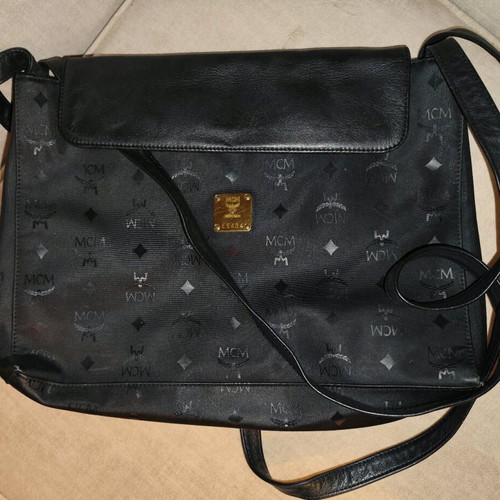 MCM shoulder bag used, black, with multiple compartments