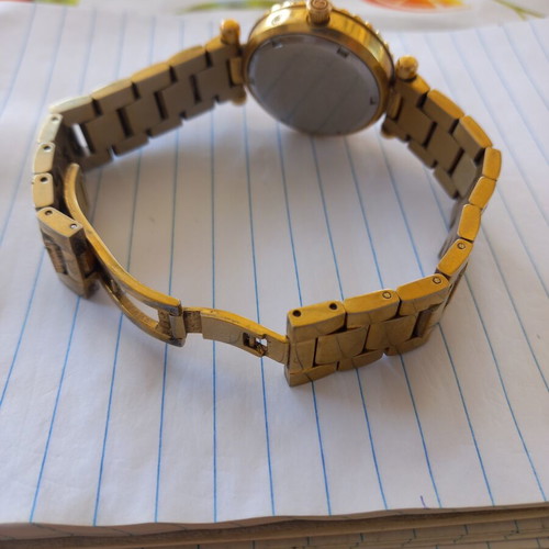 Guess women's watch, gold tone