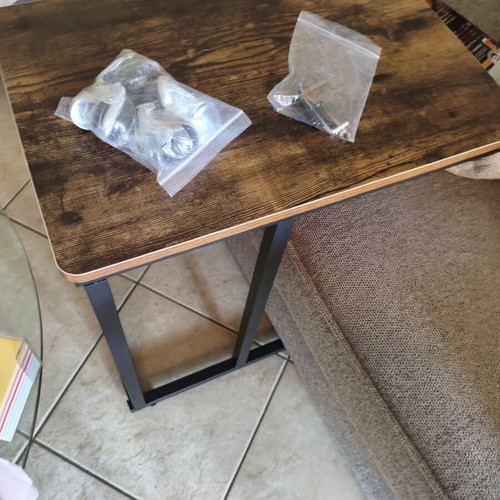 Wooden side table with metal base and wheels