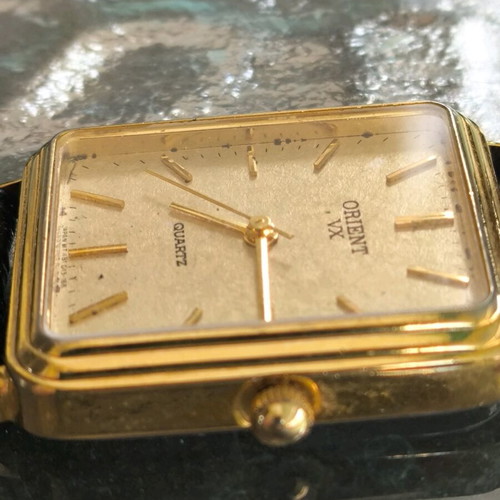 Vintage Orient watch used with leather strap