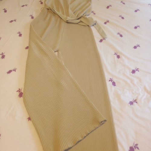 Beige jumpsuit like new, elastic waist, pleated bottom, size S