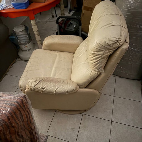 Leather armchair used with recline and 360° swivel