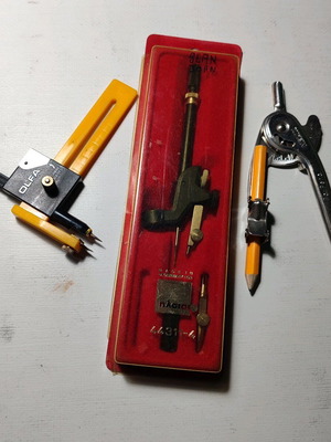 Various rapidograph compasses, cutter and pencil pack used
