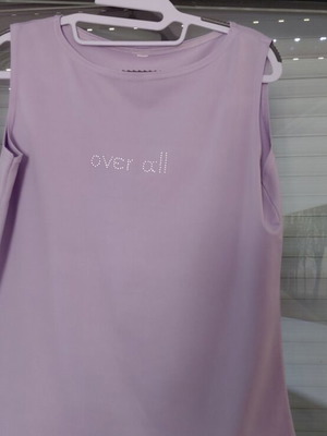 Women's lilac sleeveless top with front detail, size M