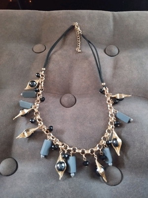 Handmade necklace with chain and leather cord, new, multicolored gold-tone