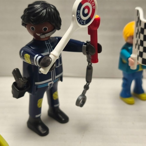 Playmobil race track like new with motorcycle, 2 cars, 3 figures, police officer
