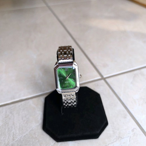 Women's watch new, silver with green dial