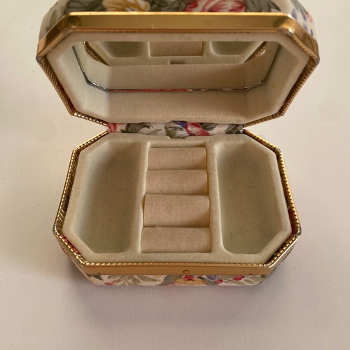 Vintage jewelry box used with mirror and floral fabric design