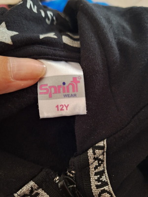 Sprintwear jacket for girls used, size 12 years, black and silver