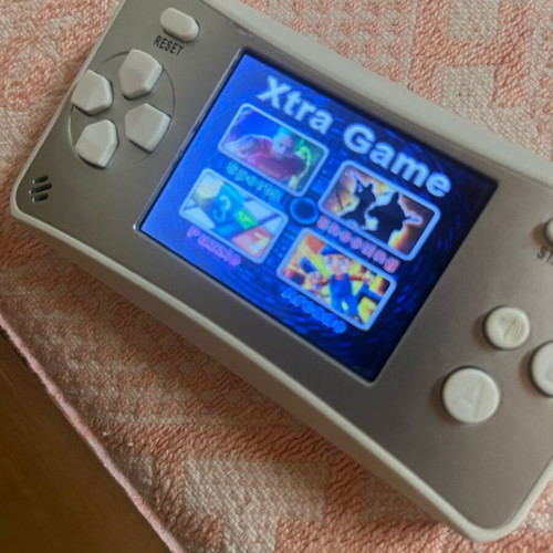 Retro handheld electronic game like new, 4 game types