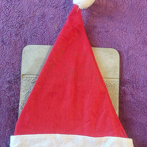 Santa Claus hat with gold glitter