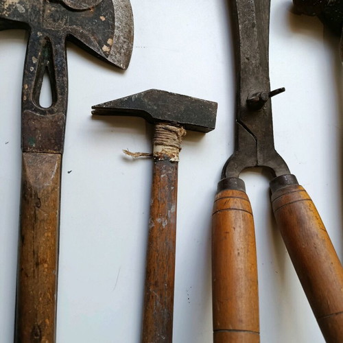 Set of old handmade tools used with wooden handles