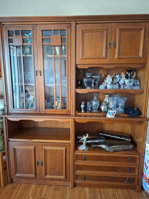Wooden furniture unit with cabinets and drawers used