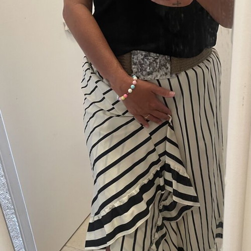 Striped black and white midi skirt with elastic waist and ruffle