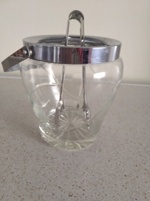Vintage ice bucket used with tongs