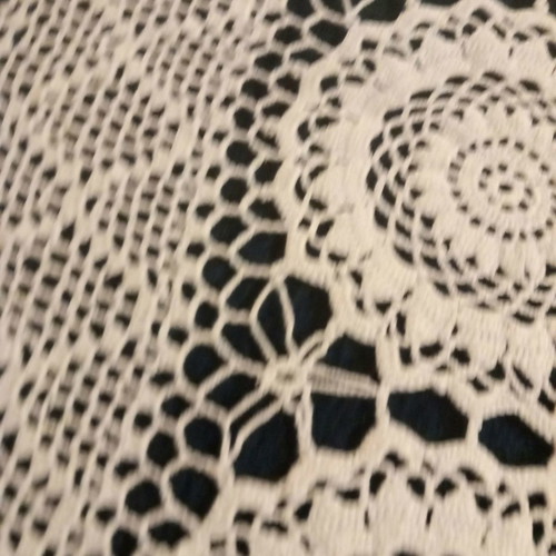Knitted handmade blanket used white with fine yarn
