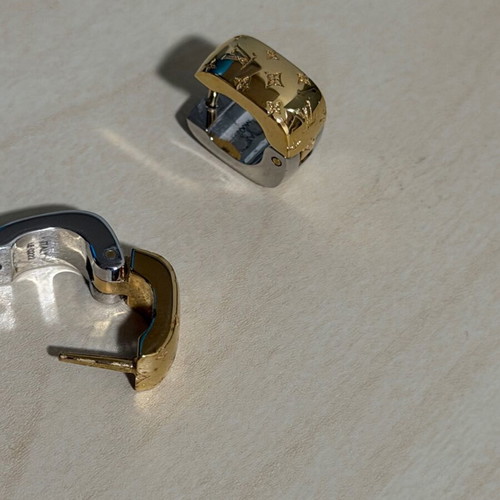 Louis Vuitton earrings like new, gold and silver