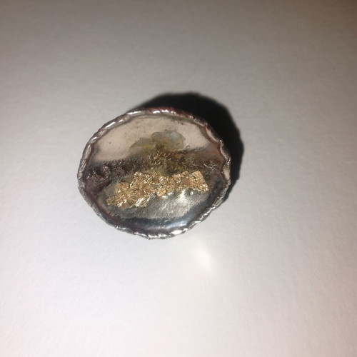 Ring like new, adjustable size, gold and silver color