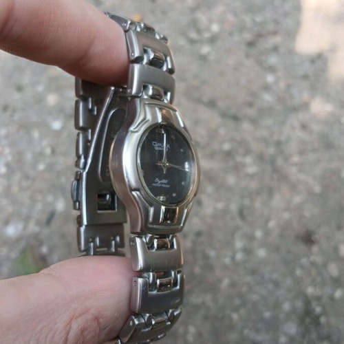 Omax Quartz Model HB 0239 watch like new, silver unisex