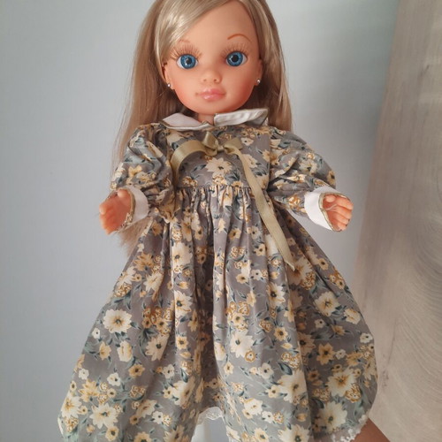 Nancy Famosa doll 2010 with 3 vintage dresses