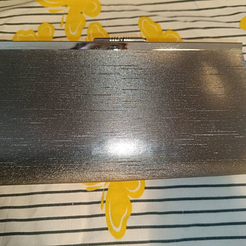 Clutch bag like new, silver