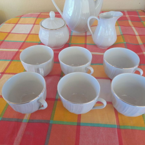 Porcelain tea set 9 pieces used, classic elegant design